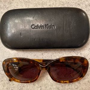 Calvin Klein sunglasses with case.